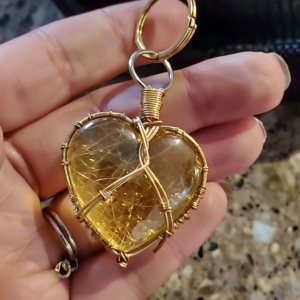 Gold wire-wrapped heart keychain with premium resin