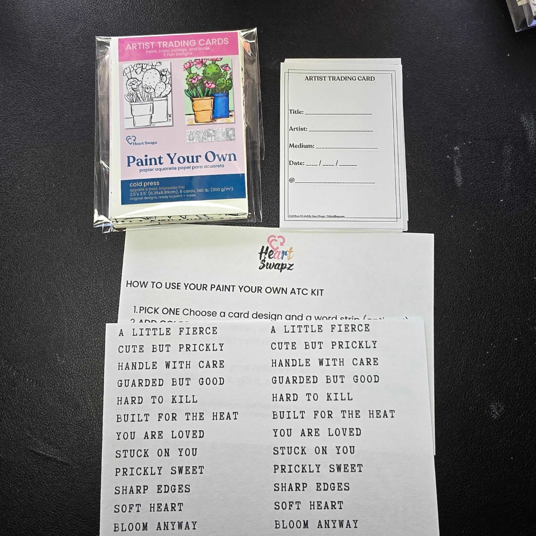 Paint Your Own ATC Kit cactus theme showing kit includes instruction insert, word strips sheet, packaged cards, and swap-ready backs