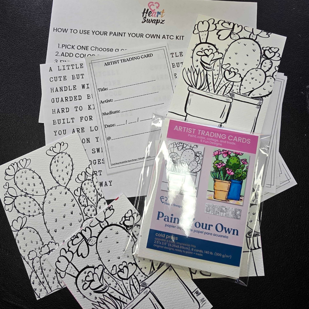 Paint Your Own ATC Kit cactus theme flat lay showing packaged ATC cards, swap-ready backs, instruction insert, and word strip sheet